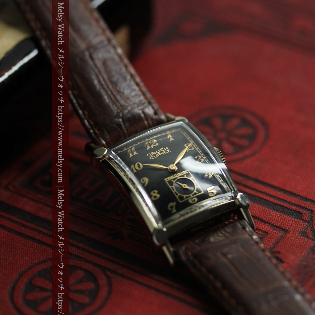 カーベックス 形の特殊な黒&金のグリュエンのアンティーク腕時計