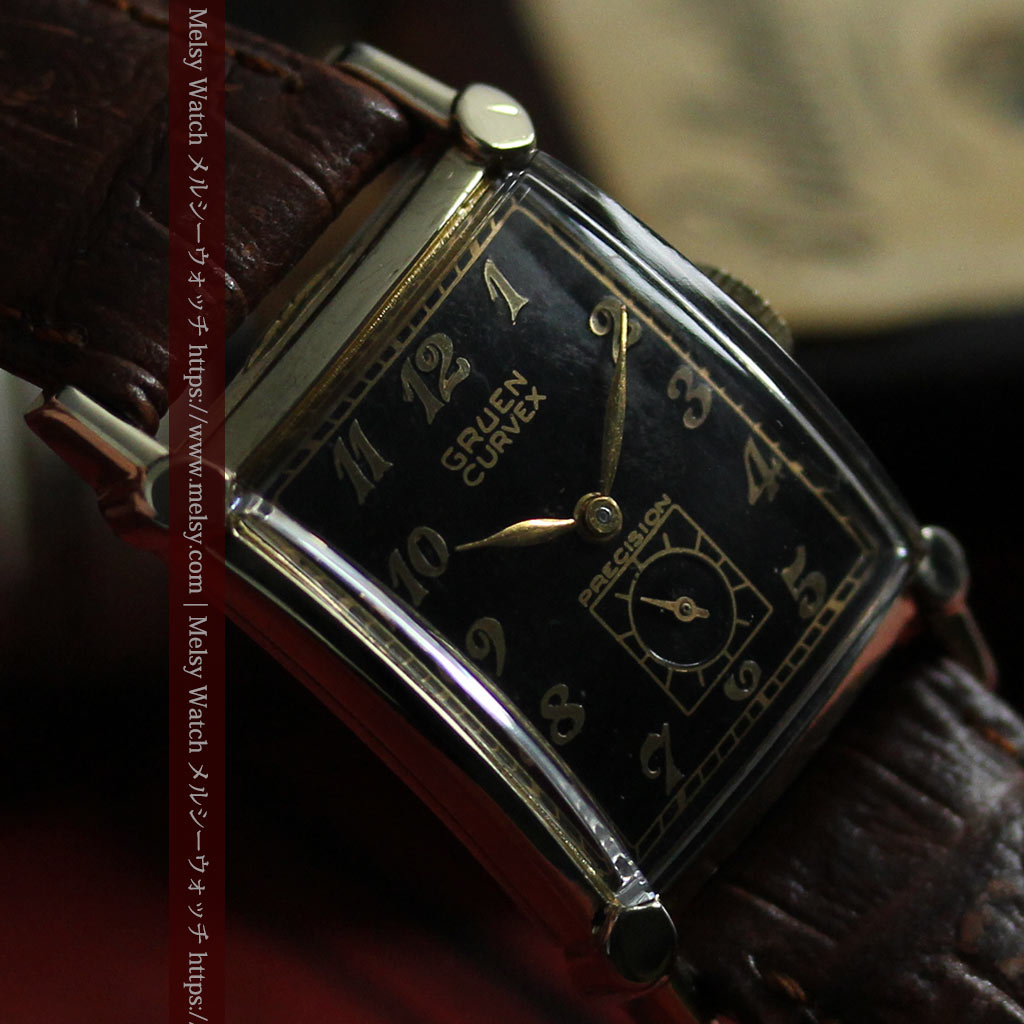 カーベックス 形の特殊な黒u0026金のグリュエンのアンティーク腕時計